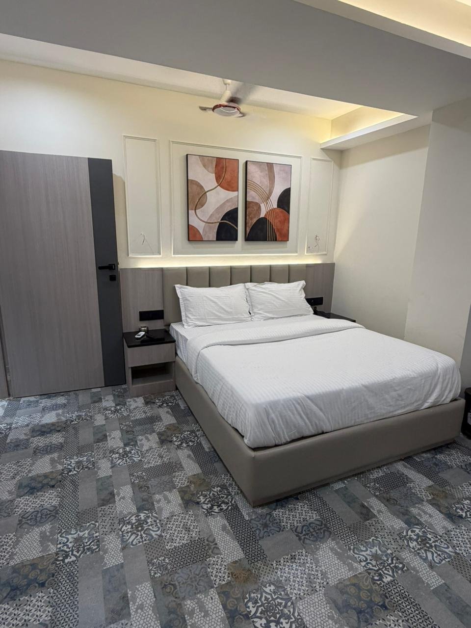 Neatly made hotel bed